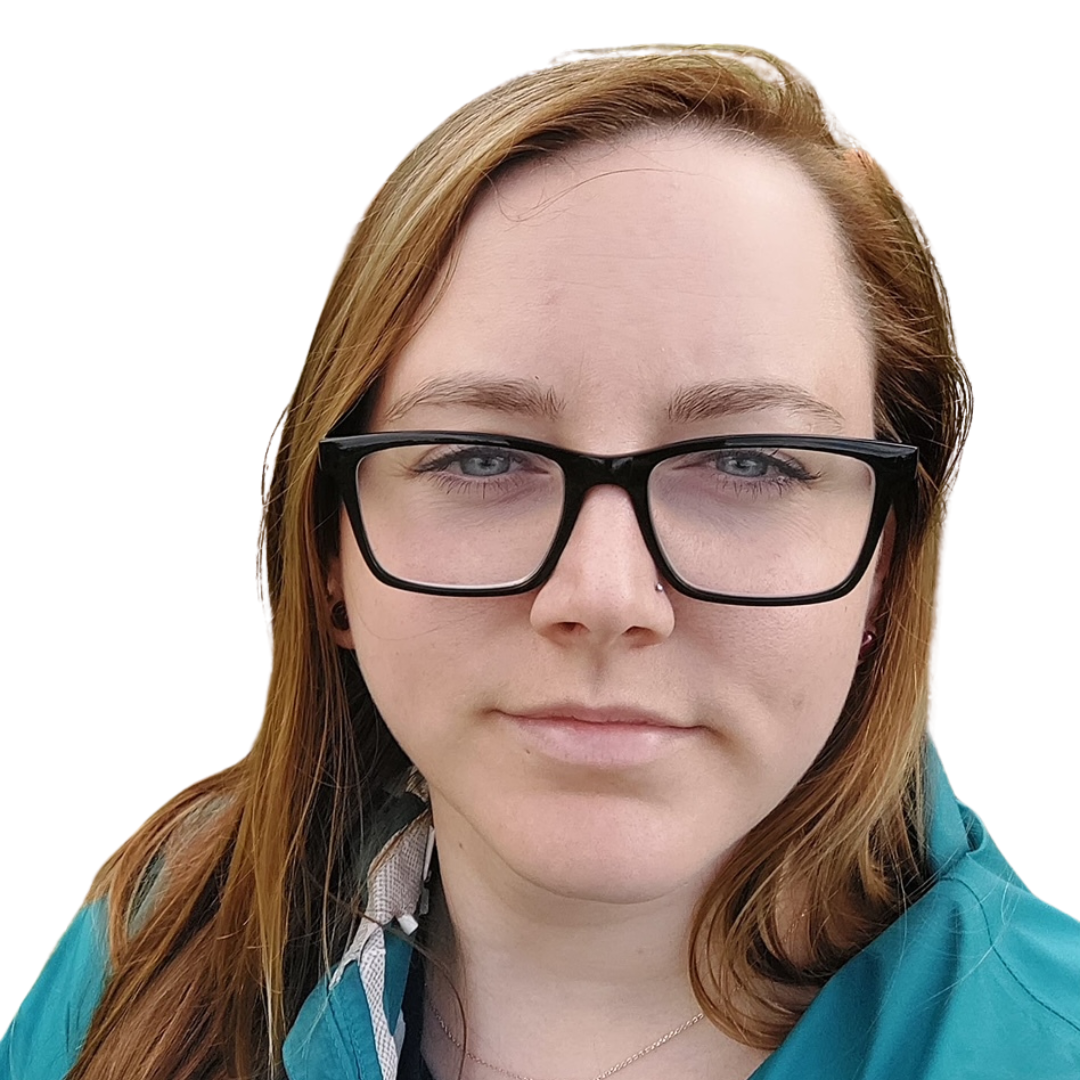Portrait of Amanda with long brown hair and black glasses, wearing a teal top against a white background.